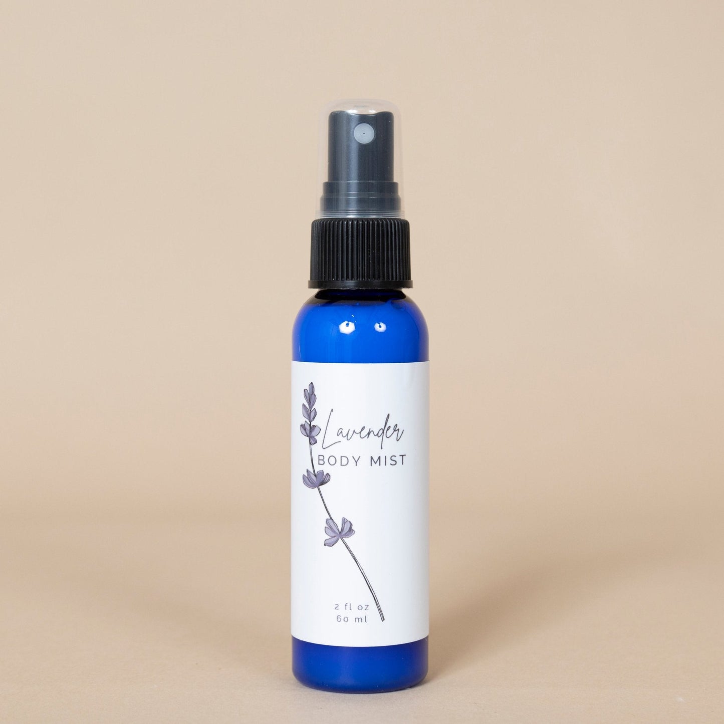 Lavender Body Mist showcased on a marble surface highlighting its elegant packaging design