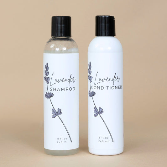Lavender Conditioner and Lavender Shampoo set elegantly arranged together, highlighting a complete lavender-infused hair care duo.