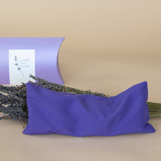 Lavender Eye Pillow in a rich purple shade, shown folded for use during yoga or meditation.