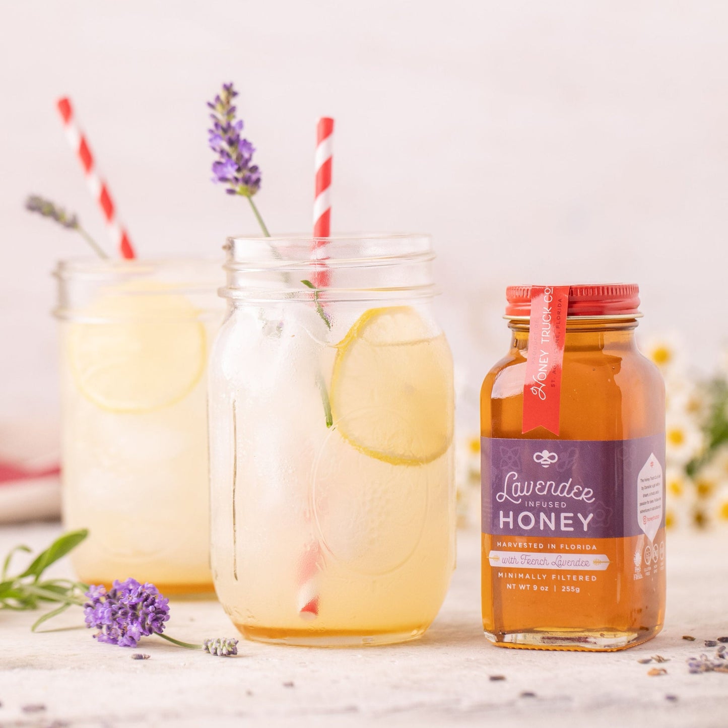 Lavender Honey in a golden hue, highlighting pure honey blended with soothing lavender for a rich, aromatic flavor.