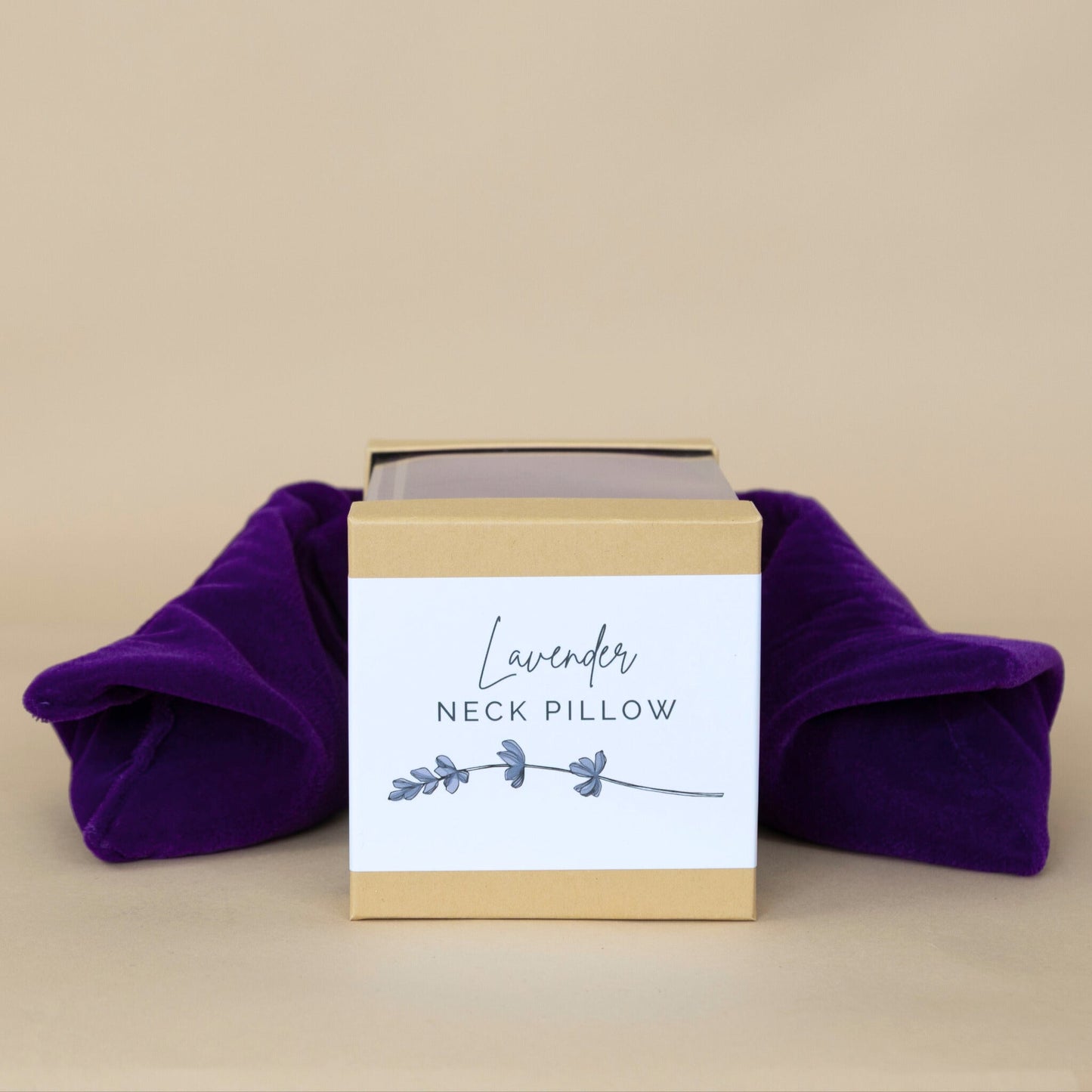 Lavender Neck Pillow nestled in a sturdy kraft box, highlighting the elegant and calming presentation.