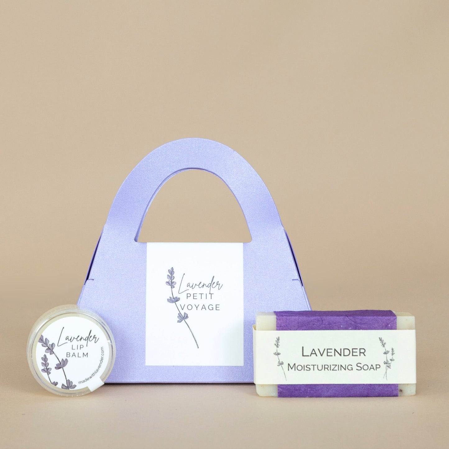 Lavender Petit Voyage Personal Care Collection featuring travel-sized lavender-infused skincare essentials arranged elegantly