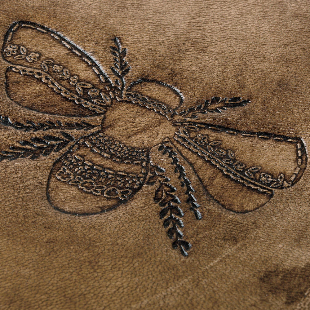 Leather Bee Journal top view emphasizing the lavender bee embossed cover and premium quality leather material.