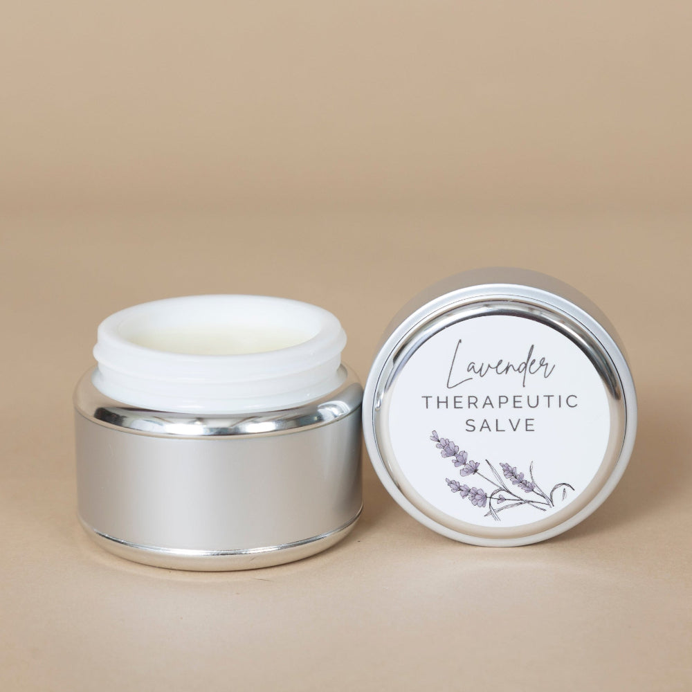 One of our most popular lavender products for the body - a jar of lavender therapeutic salve sitting on a table