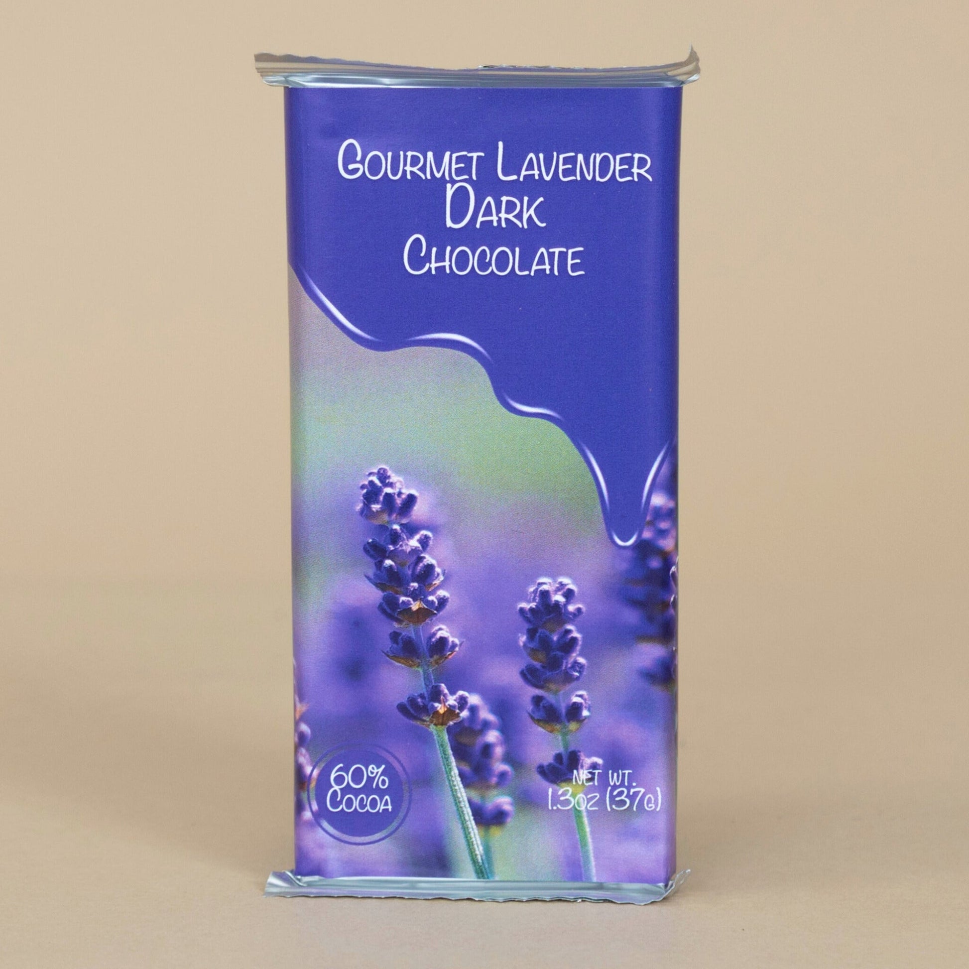 Gourmet Lavender Dark Chocolate bars arranged elegantly on a rustic wooden surface, highlighting their rich, dark hue.