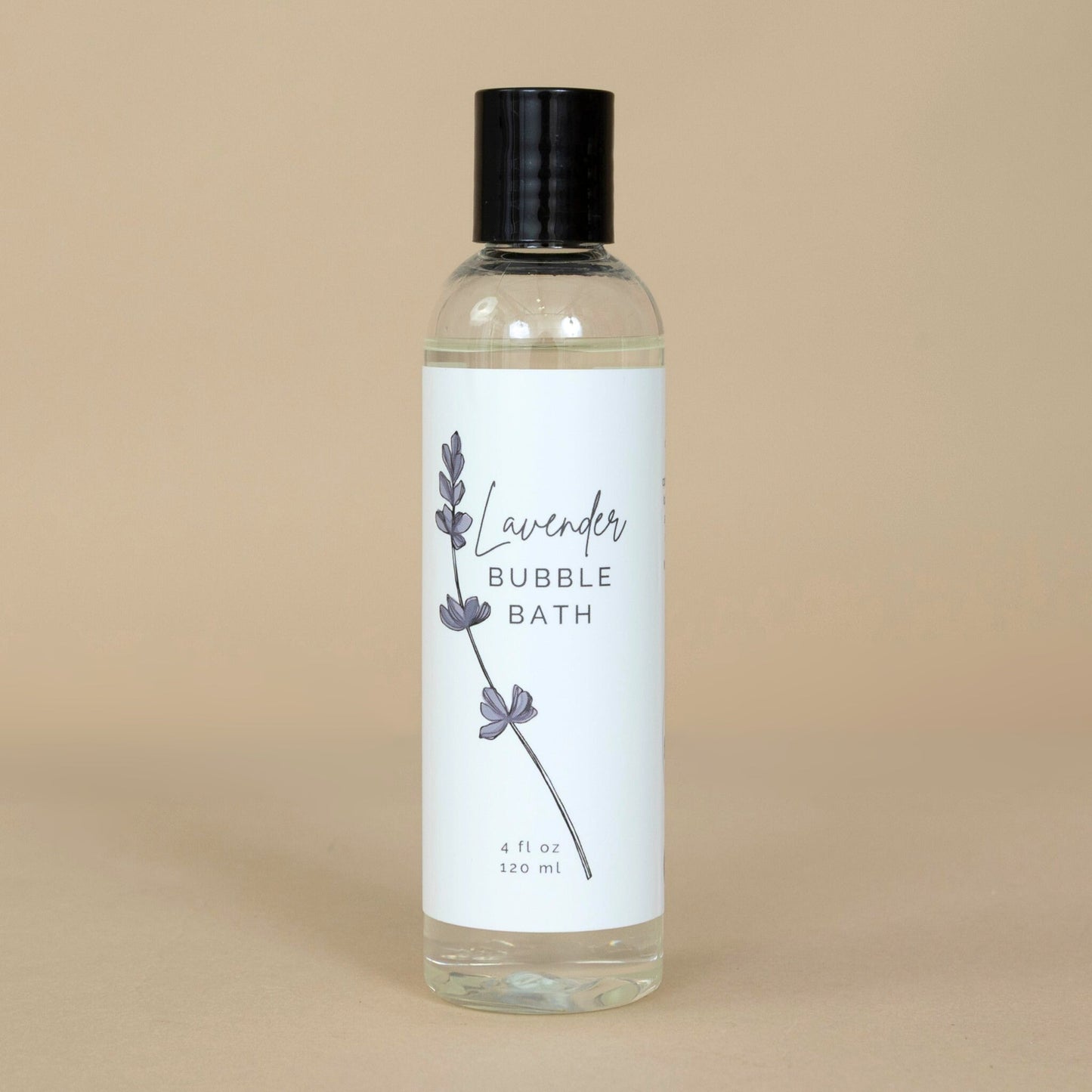Lavender Bubble Bath bottle elegantly presented beside sprigs of lavender for a calming effect