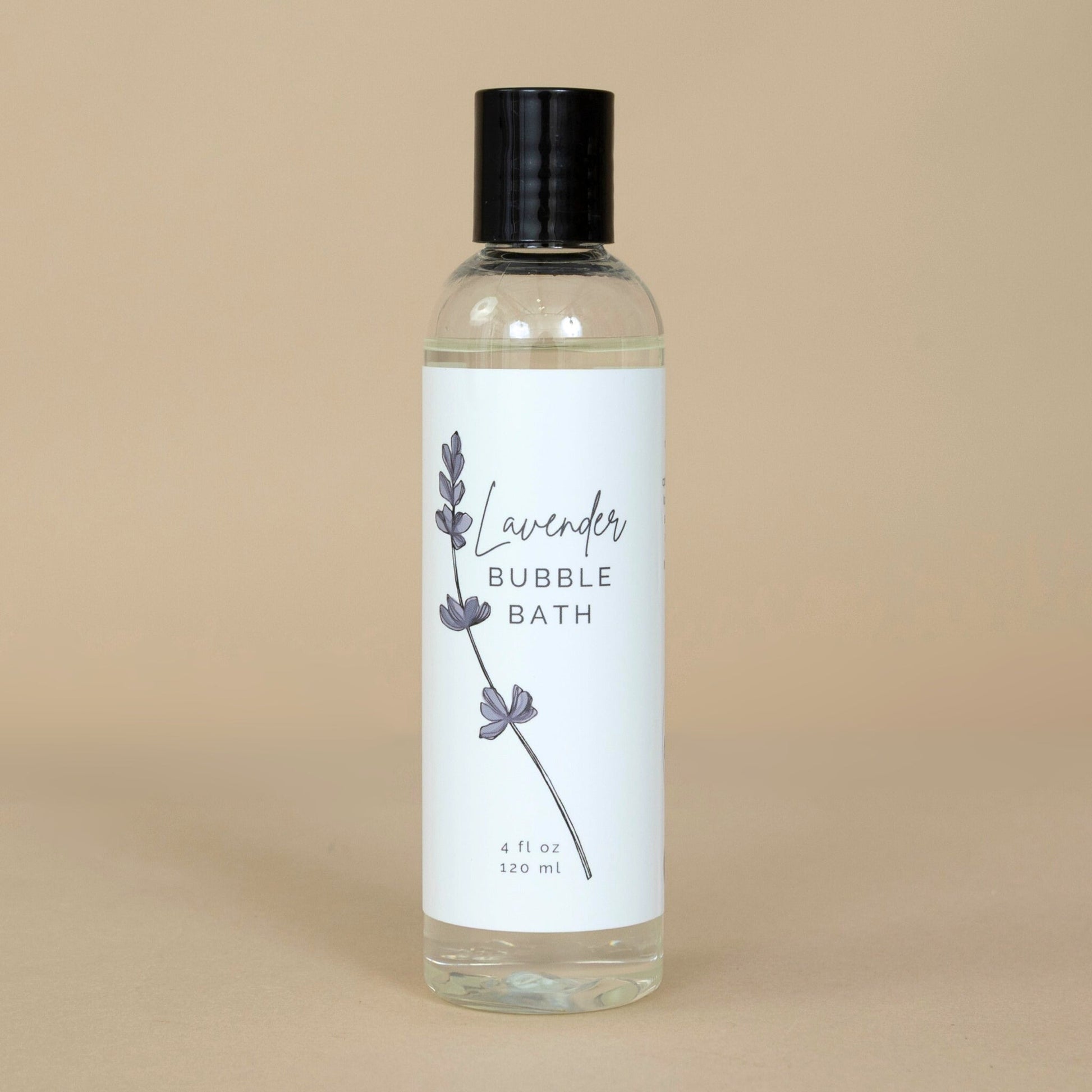 Lavender Bubble Bath bottle elegantly presented beside sprigs of lavender for a calming effect