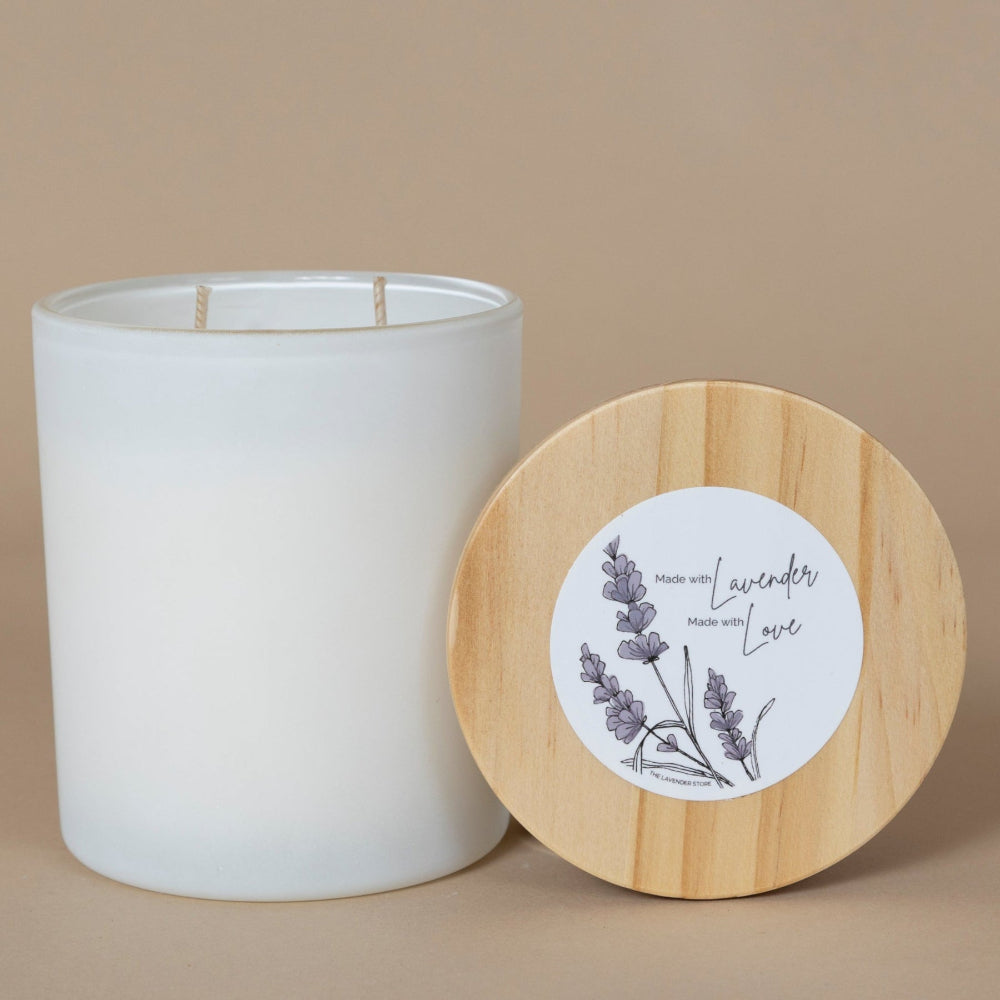 Lavender Essential Oil Candle - large pictured as an aromatherapy candle in a glass jar with a calming lavender scent