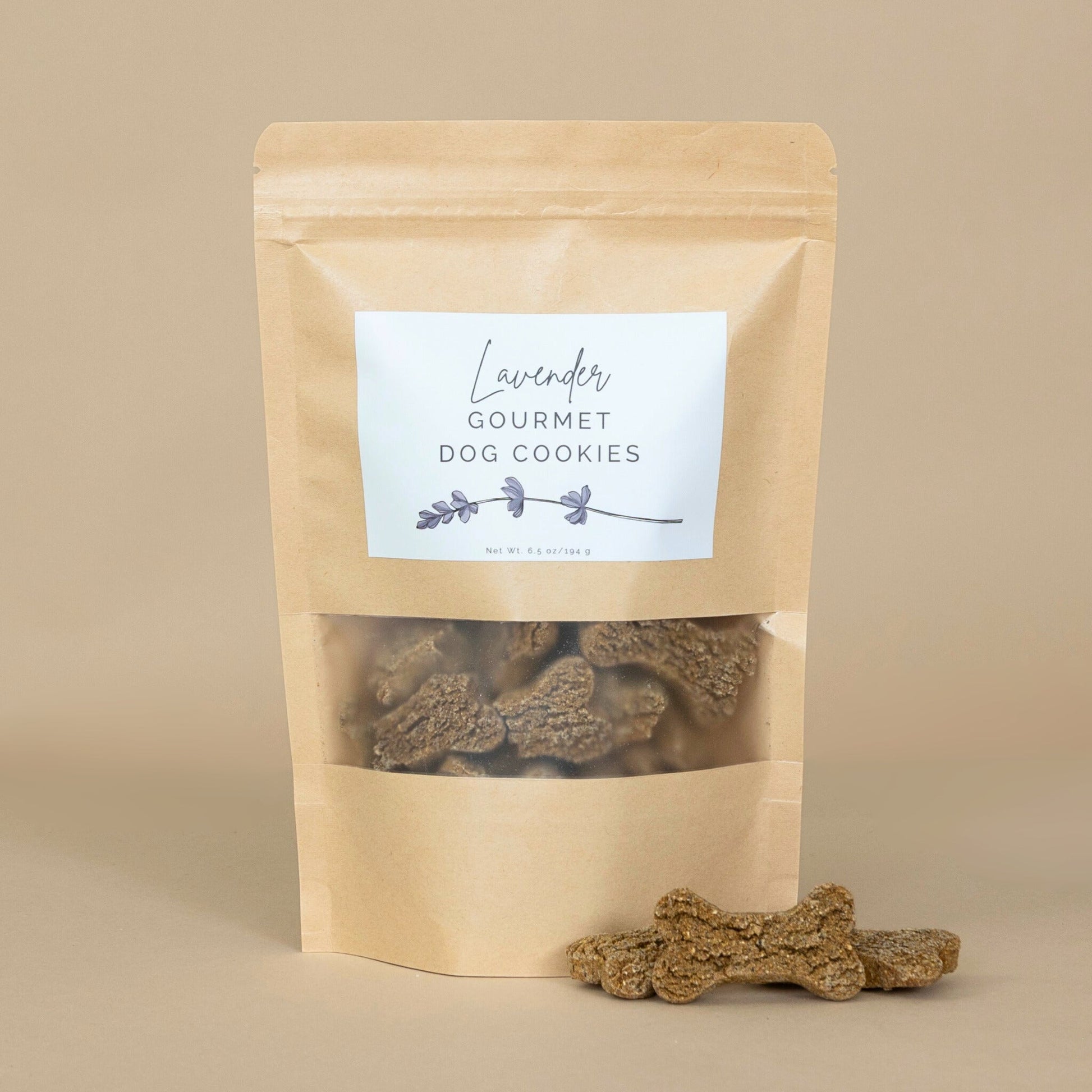 Lavender Gourmet Dog Cookies neatly arranged on a white plate, showcasing their artisan design and edible lavender topping