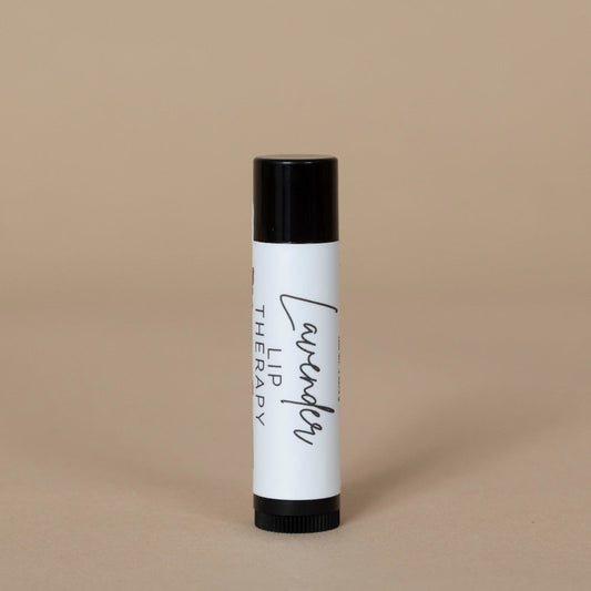 Lavender Lip Therapy shown in its elegant packaging, highlighting the soothing lavender-infused formula for smooth, hydrated lips.