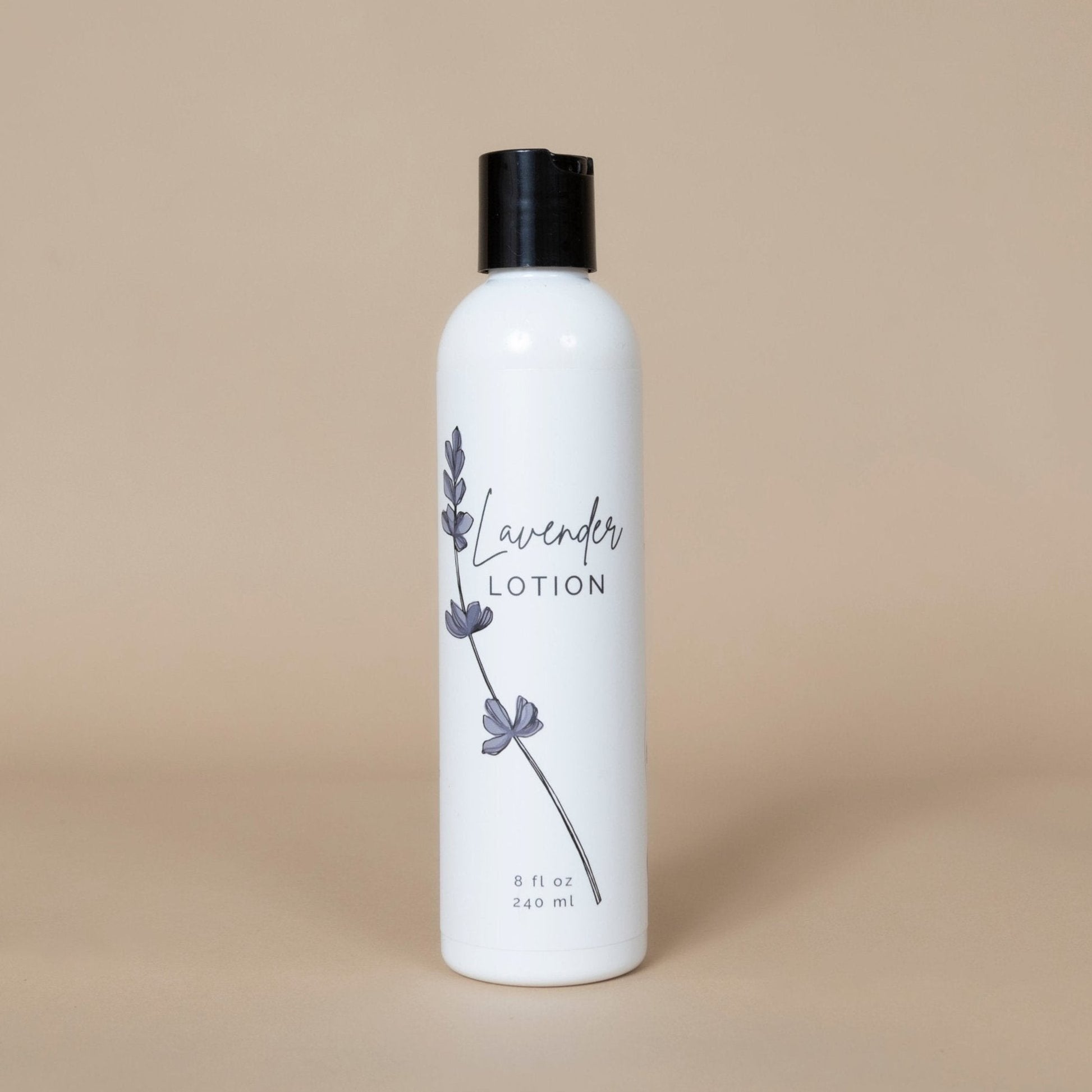Lavender Lotion in a purple bottle for all skin types on a marble countertop