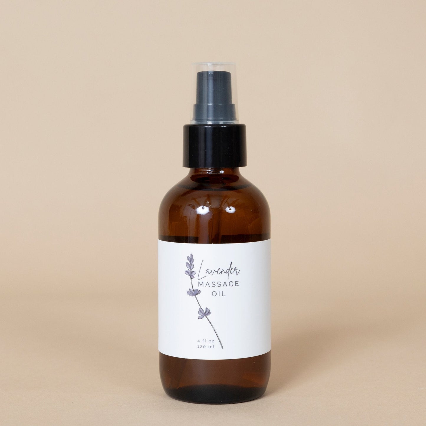 Lavender Massage Oil premium blend showcased in an elegant glass bottle
