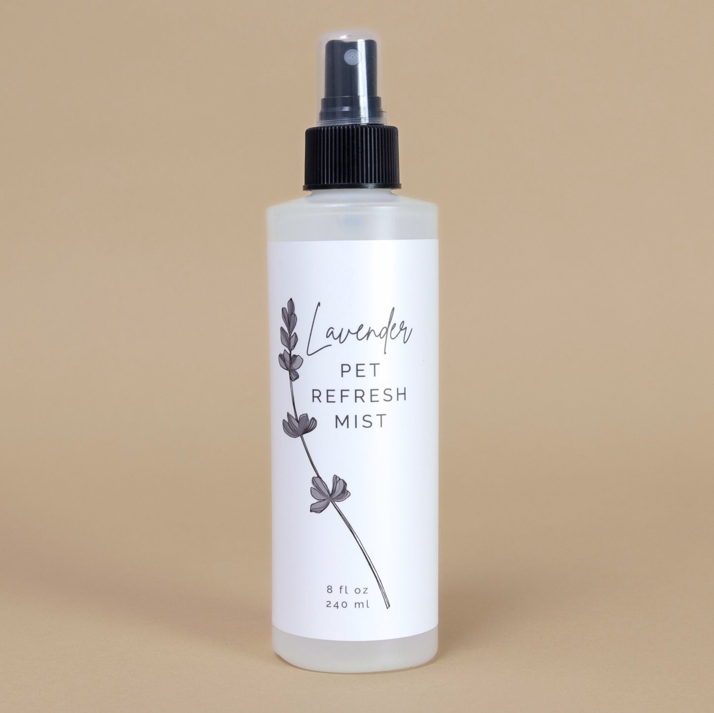 Bottle of lavender pet refresh mist on a beige background