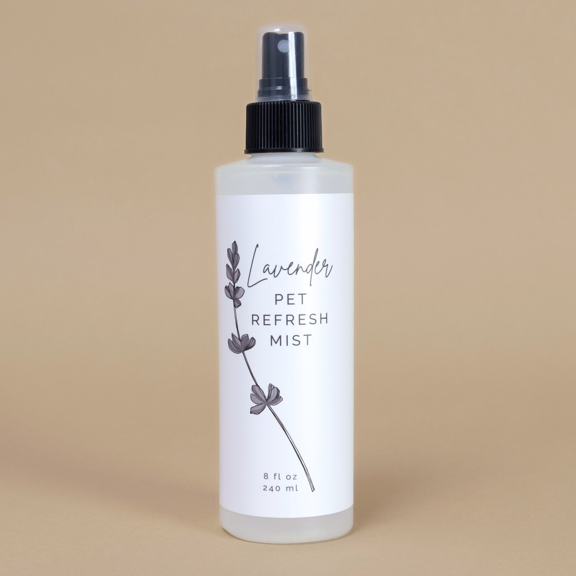 Bottle of lavender pet refresh mist on a beige background
