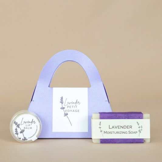 Lavender Petit Voyage Personal Care Collection featuring travel-sized lavender-infused skincare essentials arranged elegantly