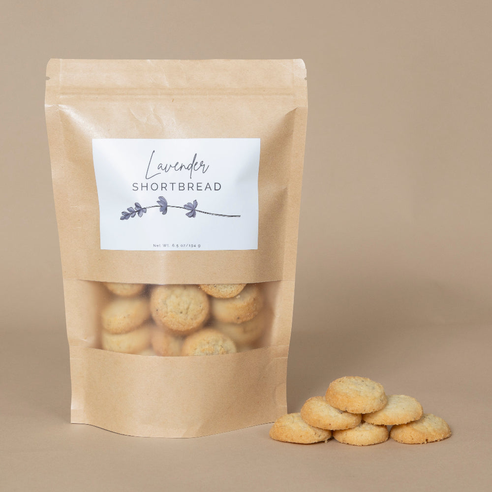Lavender Shortbread elegantly presented on a plate with sprigs of fresh lavender for a gourmet treat.