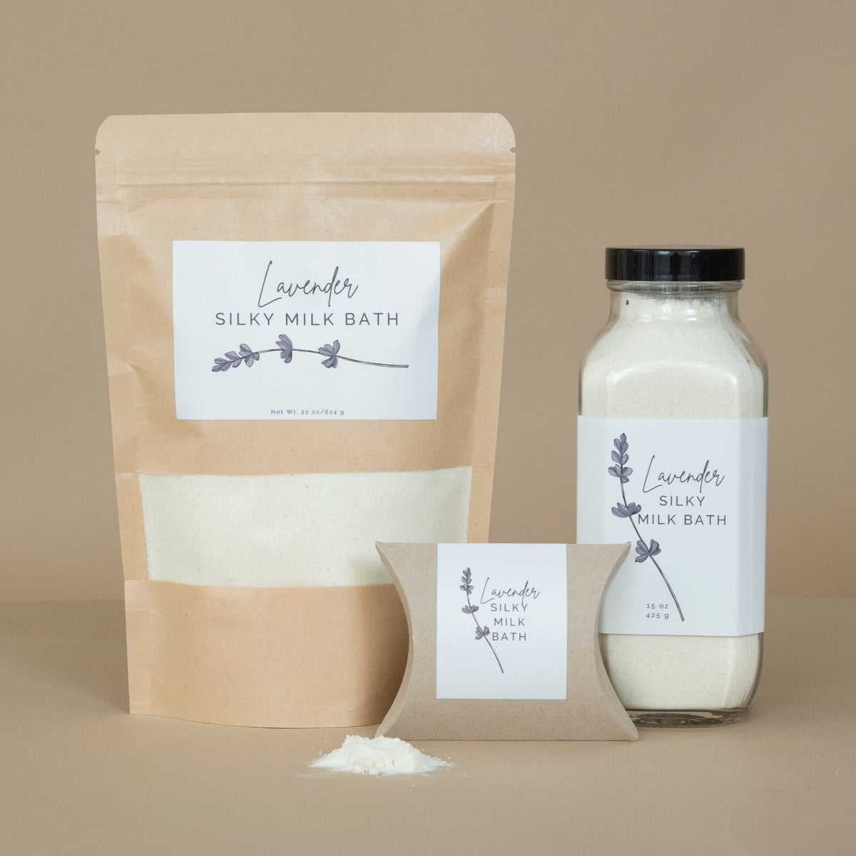Lavender Silky Milk Bath displayed in a glass jar with delicate lavender sprigs beside the product.