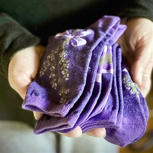 Lavender Socks worn on feet, highlighting the comfortable fit and stretch.