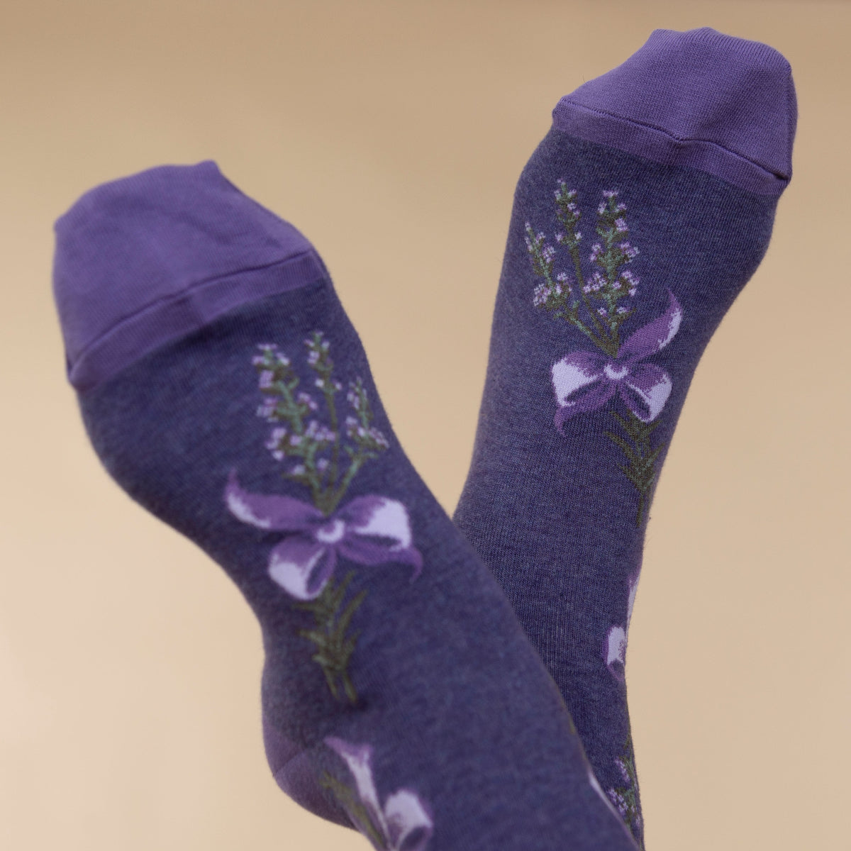Lavender Socks neatly folded to display their soft fabric and pastel color.
