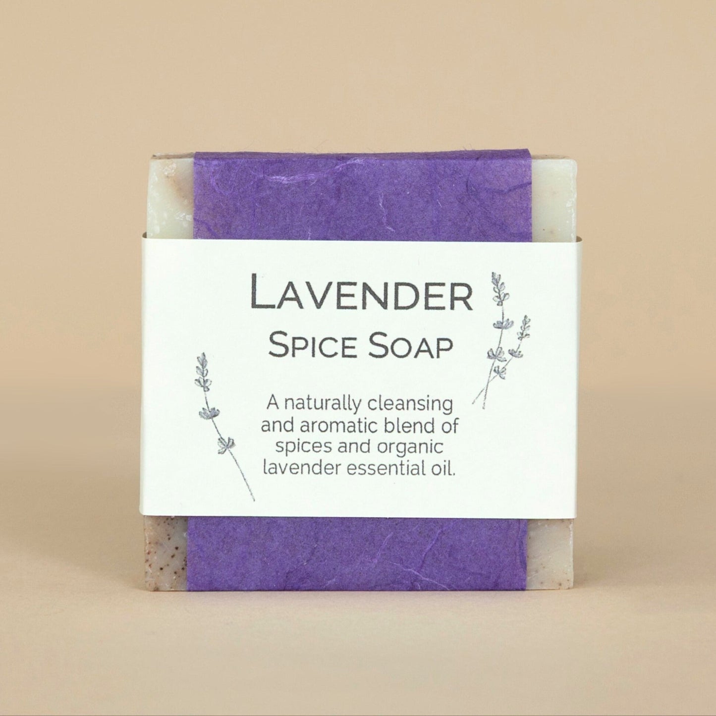 Lavender Spice Soap bar in large size displayed on a rustic wooden surface with dried lavender sprigs