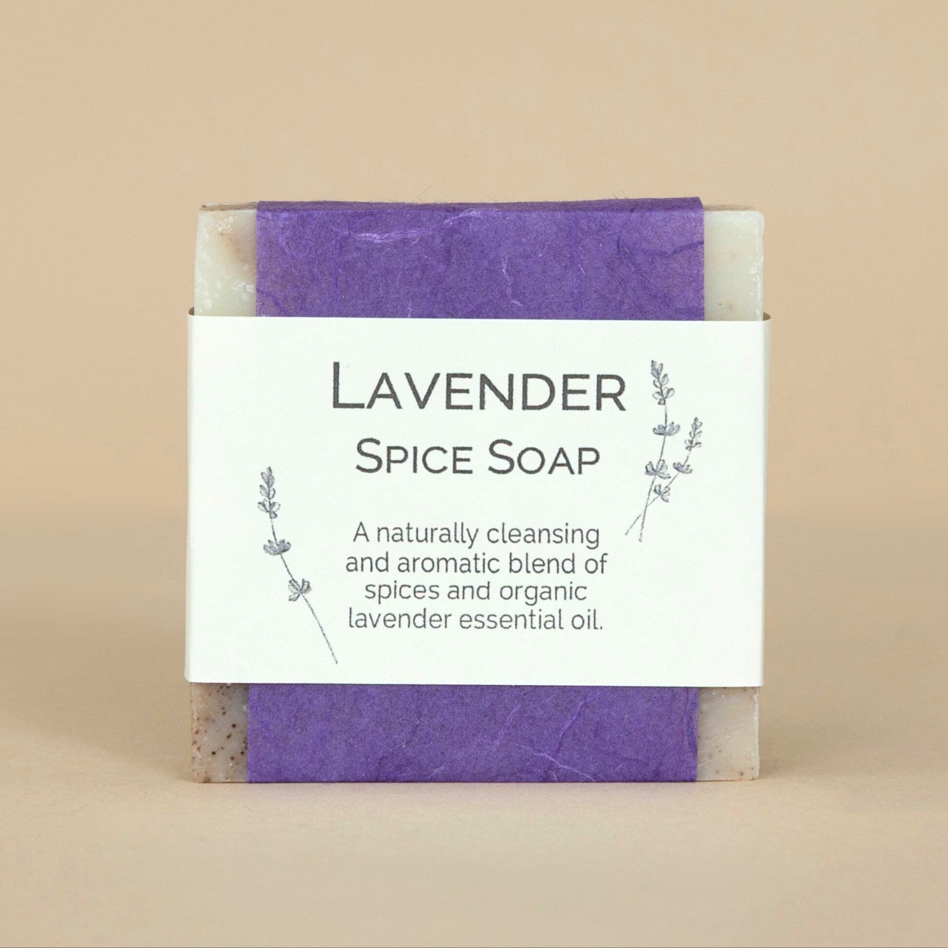 Lavender Spice Soap bar in large size displayed on a rustic wooden surface with dried lavender sprigs