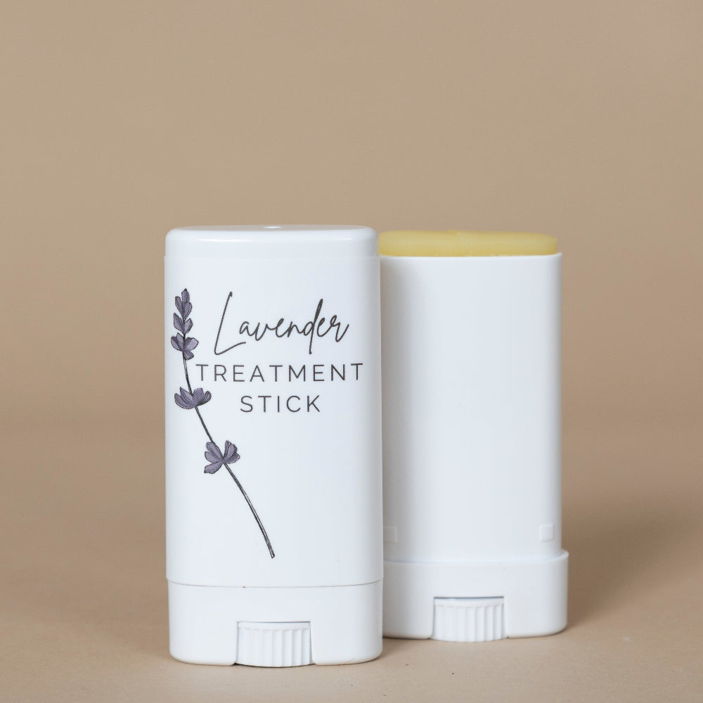 Lavender Treatment Stick displayed with its soothing purple packaging for convenient on-the-go skincare application.