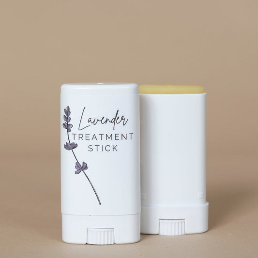 Lavender Treatment Stick displayed with its soothing purple packaging for convenient on-the-go skincare application.