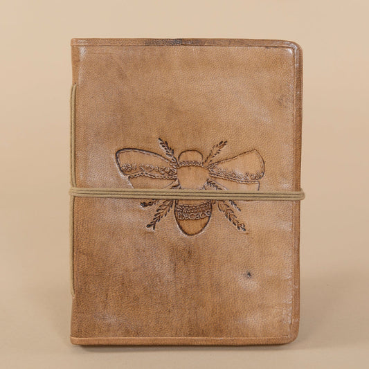 Leather Bee Journal featuring a lavender bee embossed design on the cover, showcasing intricate craftsmanship and vivid color.