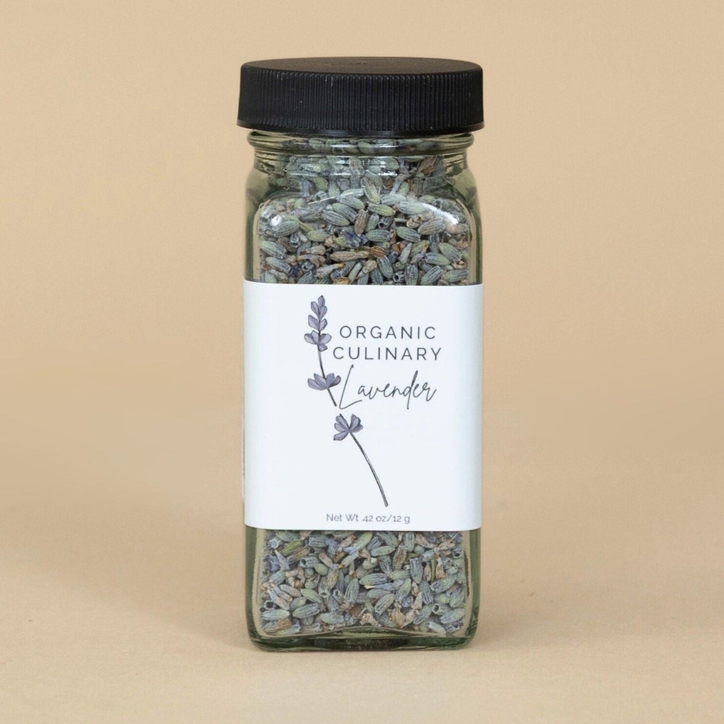 Organic Culinary Lavender dried flower buds displayed in a glass jar, ideal for cooking and baking uses