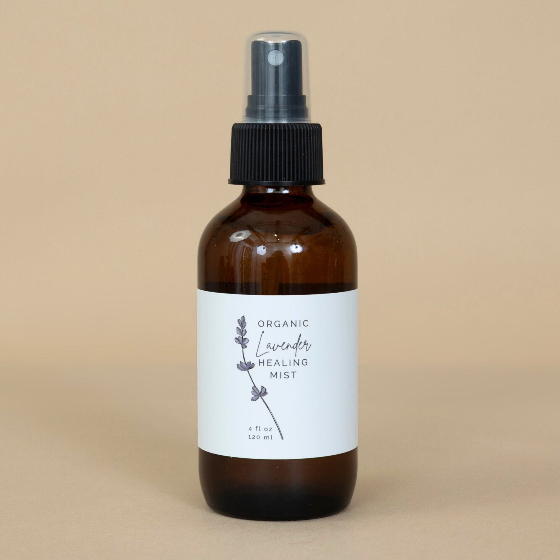 Organic Lavender Healing Mist in a sleek glass spray bottle, perfect for soothing and refreshing aromatherapy.