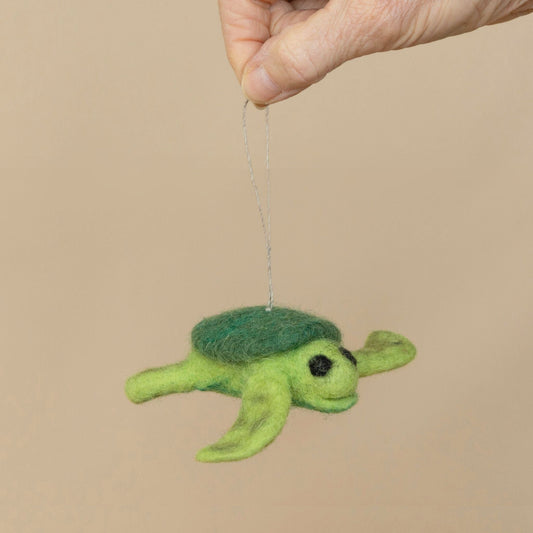 Sea Turtle Diffuser featuring a handcrafted wool design of a sea turtle for natural aroma enhancement.